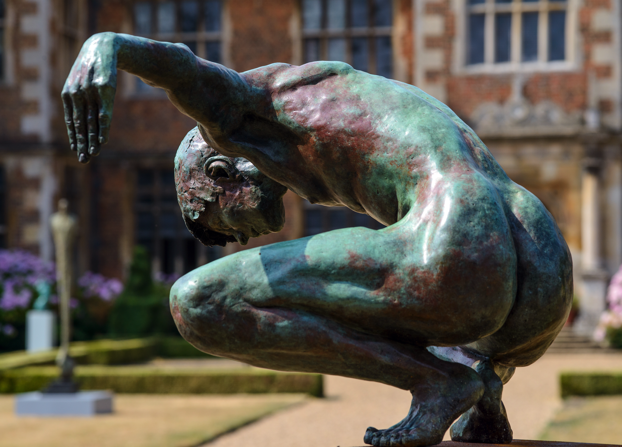 reflection male bronze sculpture